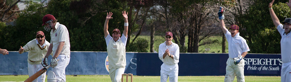 North Otago celebrate taking a wicket against Southland